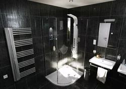 Photo of a bathroom with a black shower