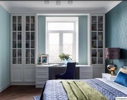 Cabinets by the window in the living room interior photo