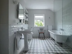 Gray walls and white floor in the bathroom photo