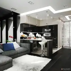 Living room design with black kitchen