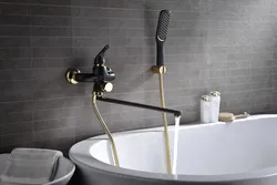 Sink and bathtub with one faucet photo
