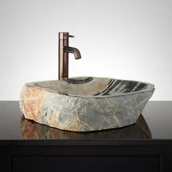 Stone sink in the bathroom interior