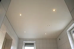 Matte ceiling in the bathroom photo