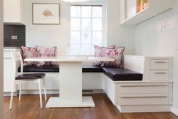 Фото кухни с диваном и столом стульями