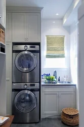 Dryer on washing machine in bathroom photo