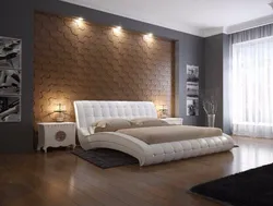 See photos of beds in the bedroom