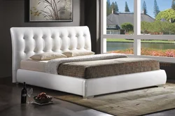 See photos of beds in the bedroom