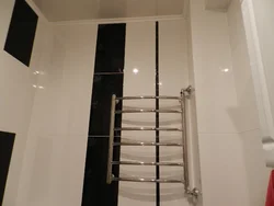 Bathroom design with heated towel rail