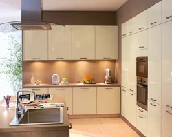 Photo Of A Kitchen With Beige Cabinets