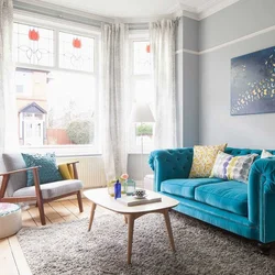 Blue sofa in the living room interior photo