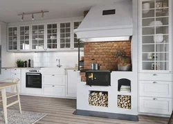 Photo of a kitchen with a stove in a wooden house photo