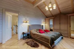 Bedroom in a house made of timber photo