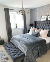 Gray curtains in the bedroom interior