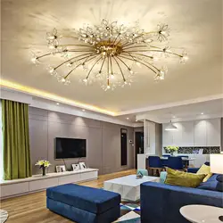 Chandelier in the living room photo in the interior with tension
