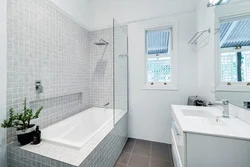 White bathroom design with tiles