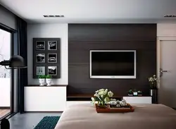 Decorate a wall in the living room with a TV in a modern style photo