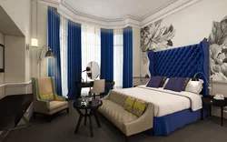 Bedroom with dark blue wallpaper photo