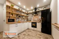 Kitchens without upper cabinets with pencil case and refrigerator photo