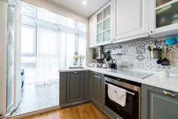 Interior design of a modern kitchen with a balcony