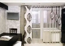 Design of curtains for living rooms in an apartment with a balcony