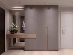 Hallway design with built-in wardrobe in a modern style apartment