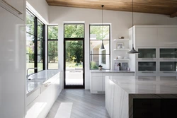 Interior of a kitchen with a balcony door