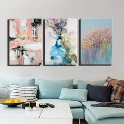 Paintings on the wall in the living room interior in a modern style