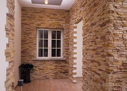 Artificial stone in the interior of the hallway photo for interior decoration