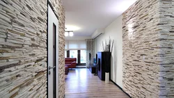 Artificial stone in the interior of the hallway photo for interior decoration