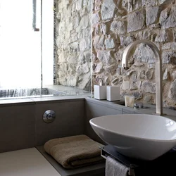Bathtub with artificial stone photo