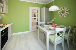 Green walls in the kitchen interior photo