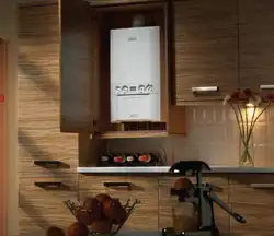 Photo of a kitchen in a house with a boiler on the wall