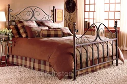 Wrought iron bed in the bedroom photo