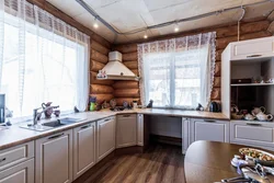 Kitchen design in a country house with a window