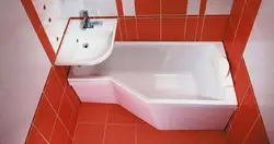 Asymmetrical bathtub in the bathroom interior