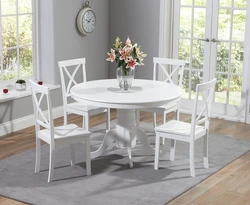 White Chairs And Table In The Kitchen Interior