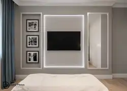 Wall design in the bedroom opposite the bed with TV