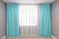 Бирюзовый цвет штор в интерьере гостиной фото