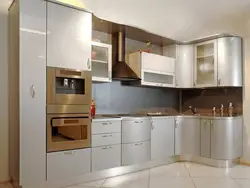 Corner kitchen design photo in modern style