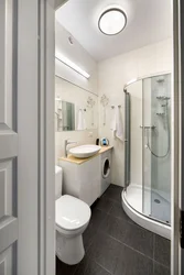 Combined bathroom with shower and washing machine design photo