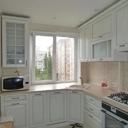 Corner Kitchen In Your House With A Window Photo