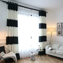 Black curtains in the living room interior