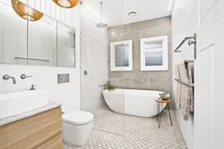 Photo of a bathroom with tiles, modern design in light colors