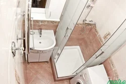 Photo of small bathrooms with shower and washing machine