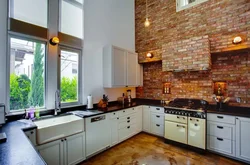 Kitchen design with bricks on the wall photo