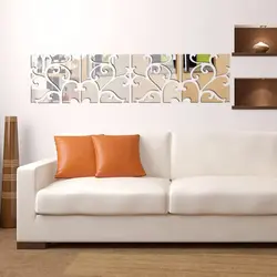 Оформление стены над диваном в гостиной фото своими
