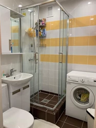 Bathroom Design With Shower And Washing Machine Photo