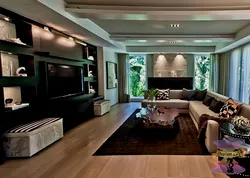 Living room interior with TV on the wall in a modern interior photo