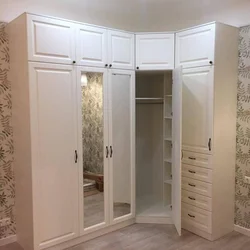 Corner wardrobe in the bedroom photo design ideas