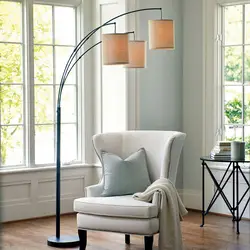 Floor lamps in the living room interior photo